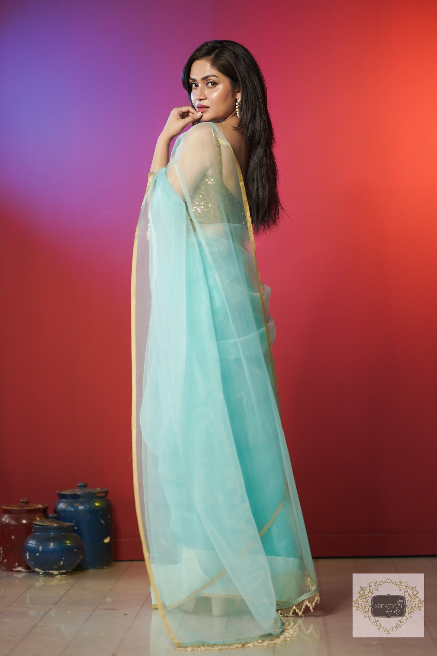 Ice Blue Organza Saree With Handmade Tassels On Pallu