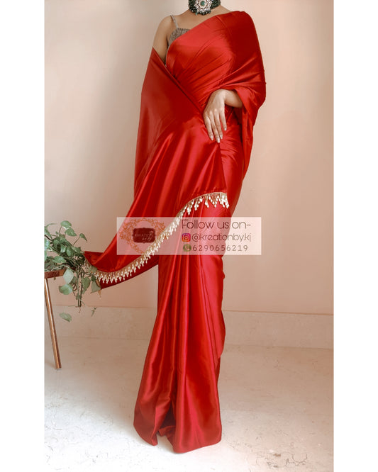 Crimson Red Satin Silk Saree With Handmade Tassels On Pallu
