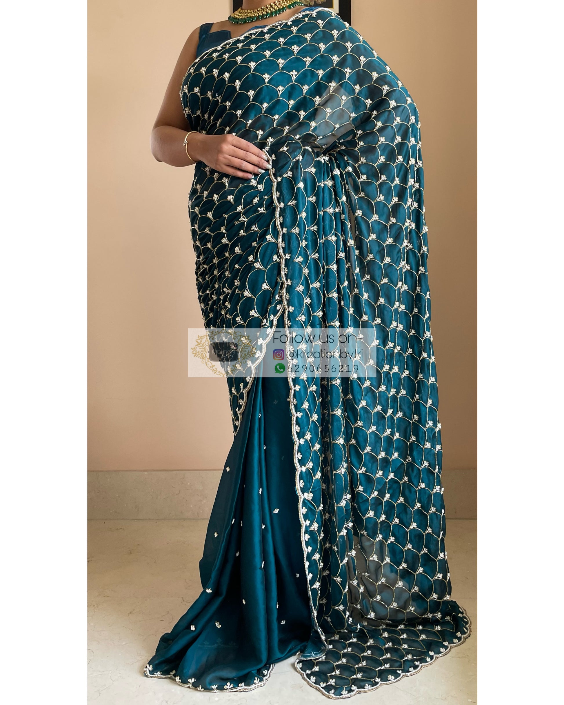 Teal Mehraab Cutdana Jaal Saree - kreationbykj