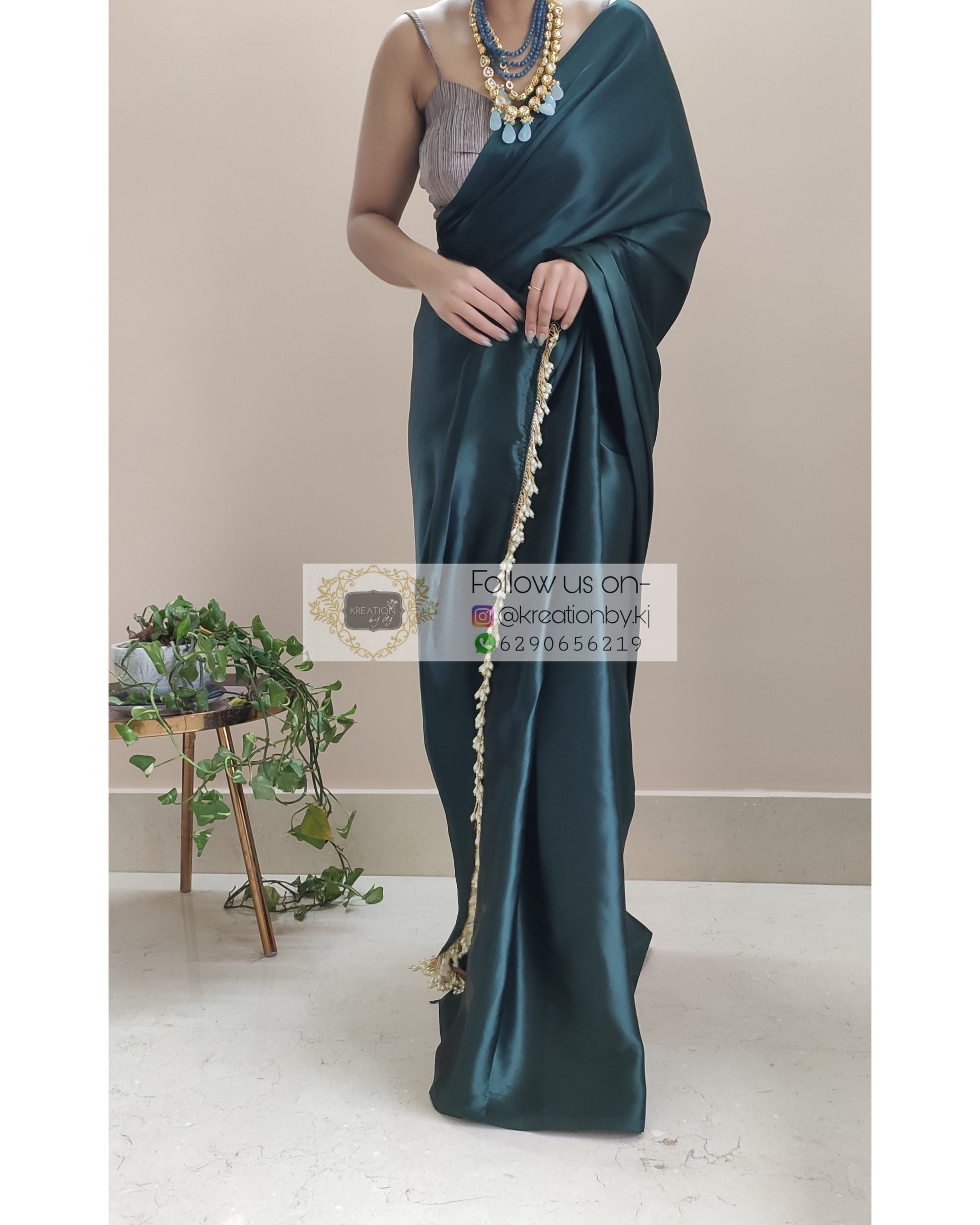 Dark Blackish Green Satin Silk Saree With Handmade Tassels On Pallu - kreationbykj