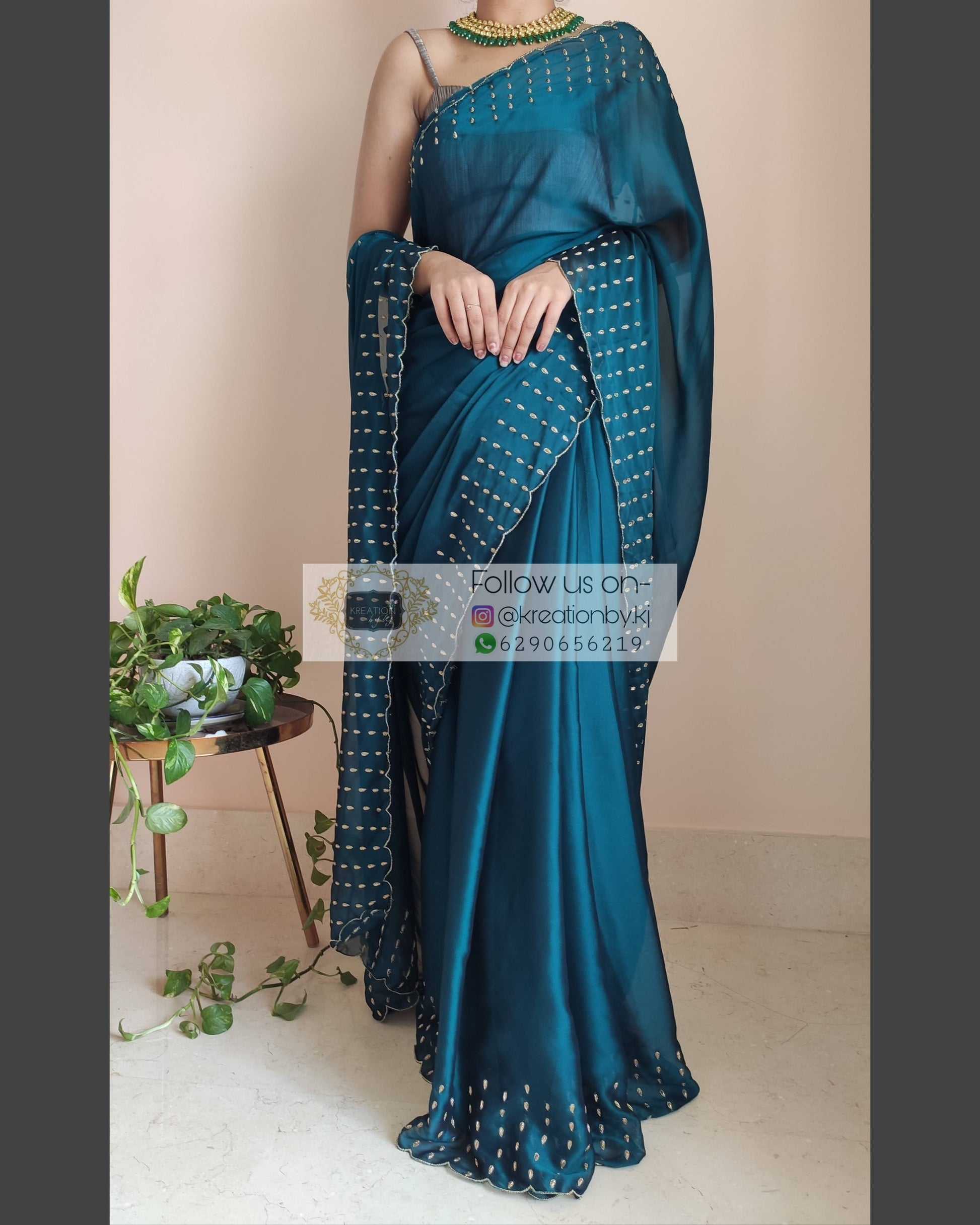 Teal Blue Georgette Silk Saree With Handembroidered Dabka Motifs On Border - kreationbykj