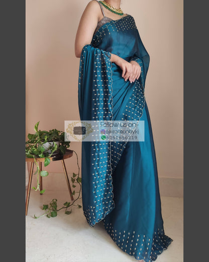 Teal Blue Georgette Silk Saree With Handembroidered Dabka Motifs On Border - kreationbykj