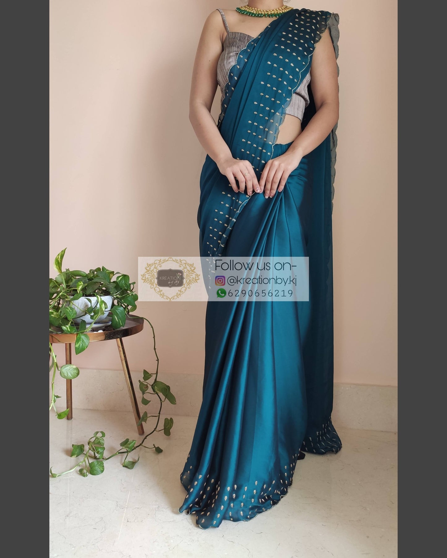 Teal Blue Georgette Silk Saree With Handembroidered Dabka Motifs On Border - kreationbykj