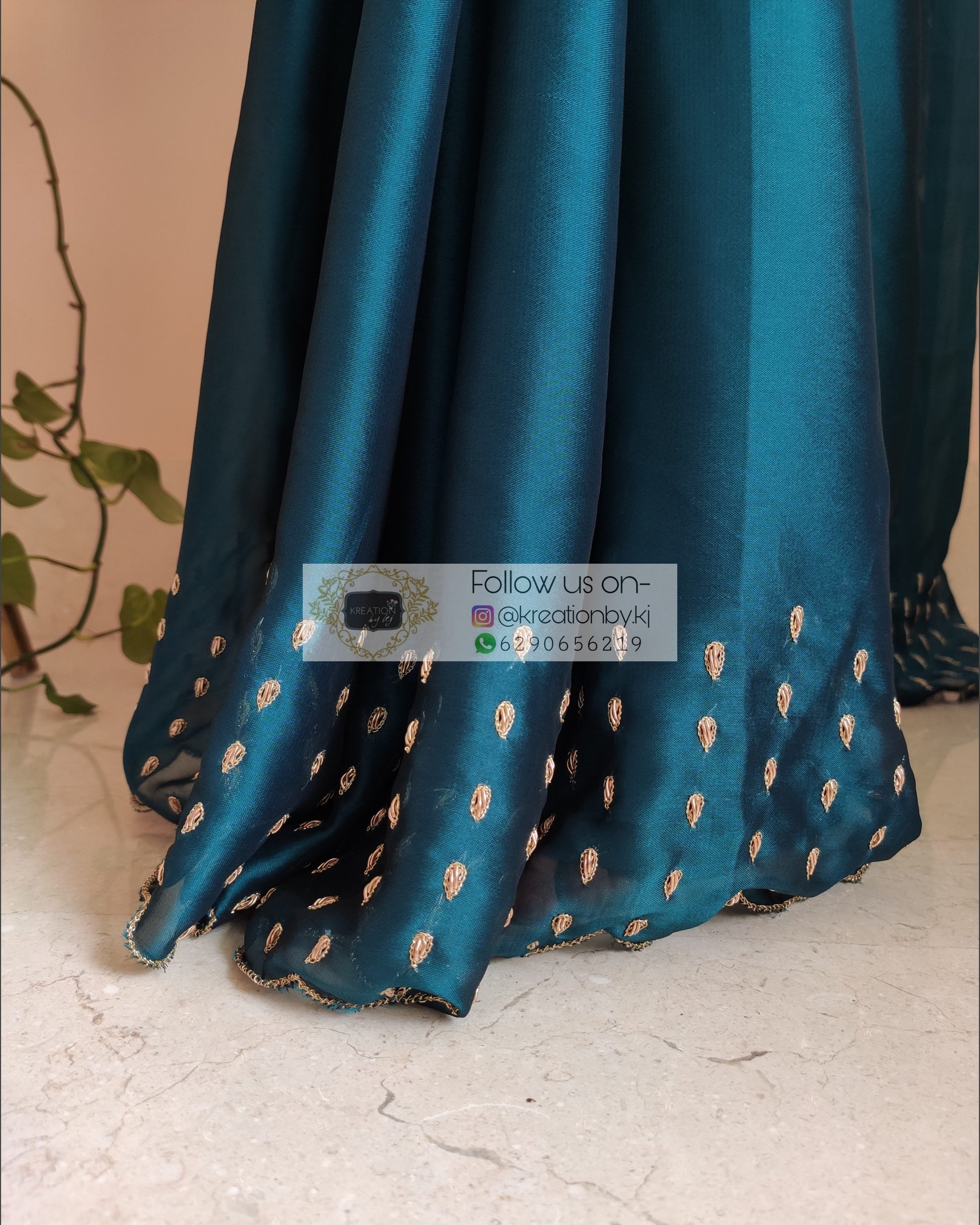 Teal Blue Georgette Silk Saree With Handembroidered Dabka Motifs On Border - kreationbykj