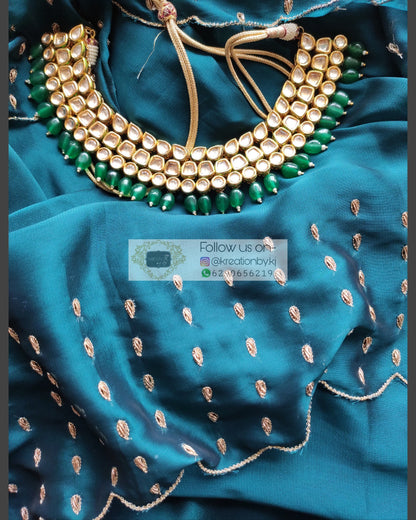 Teal Blue Georgette Silk Saree With Handembroidered Dabka Motifs On Border - kreationbykj