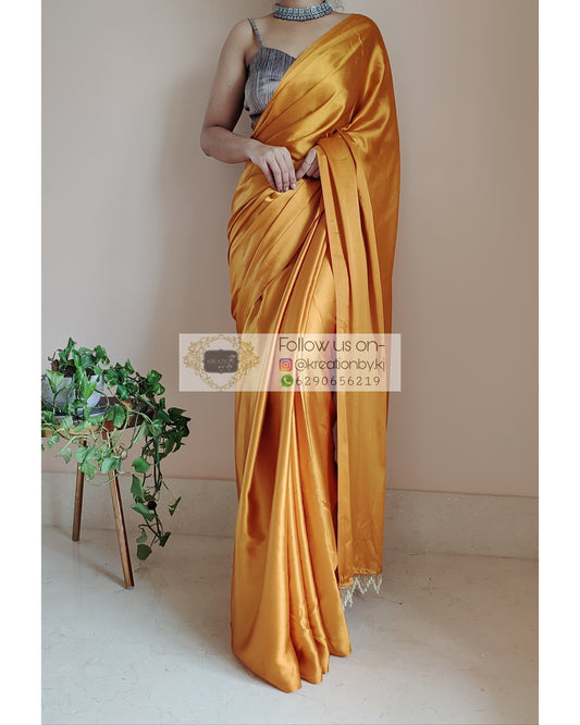 Golden Yellow Satin Silk Saree With Handmade Tassels On Pallu - kreationbykj