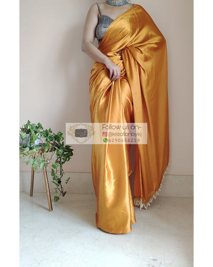 Golden Yellow Satin Silk Saree With Handmade Tassels On Pallu - kreationbykj