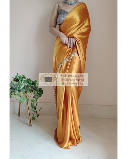 Golden Yellow Satin Silk Saree With Handmade Tassels On Pallu - kreationbykj