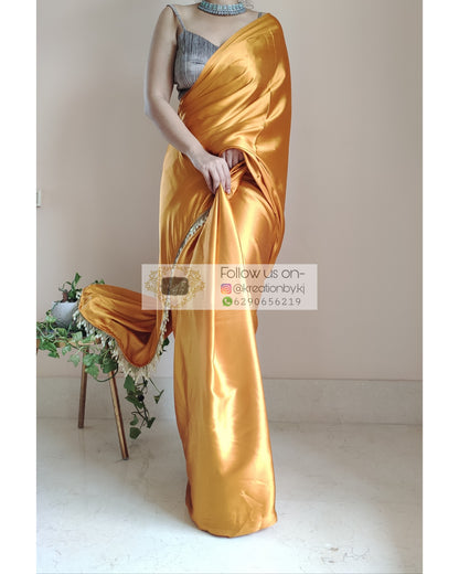 Golden Yellow Satin Silk Saree With Handmade Tassels On Pallu - kreationbykj