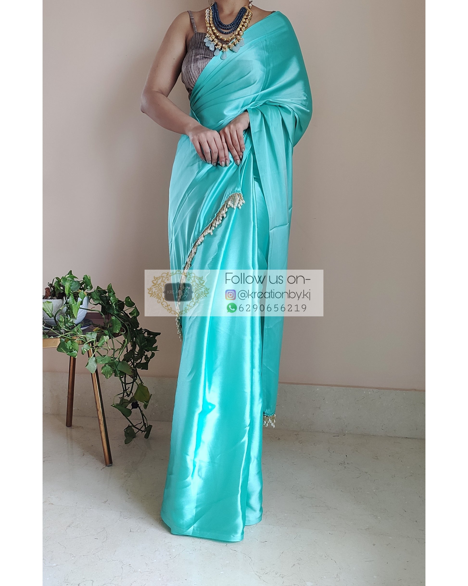 Turquoise Satin Silk Saree With Handmade Tassels On Pallu - kreationbykj