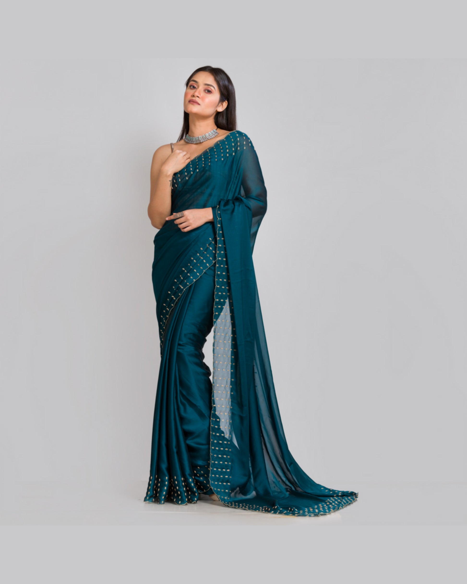 Teal Blue Georgette Silk Saree With Handembroidered Dabka Motifs On Border - kreationbykj