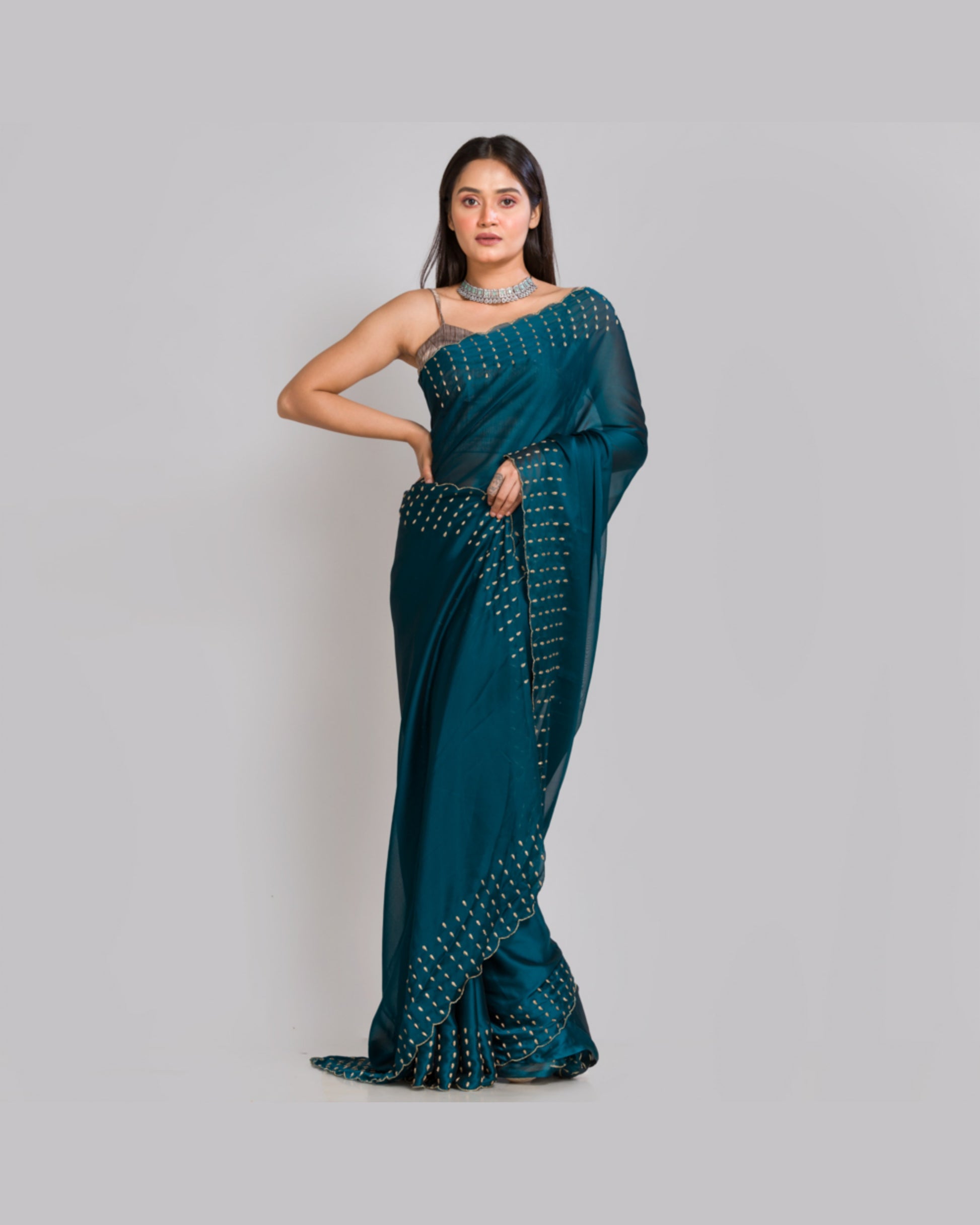 Teal Blue Georgette Silk Saree With Handembroidered Dabka Motifs On Border - kreationbykj