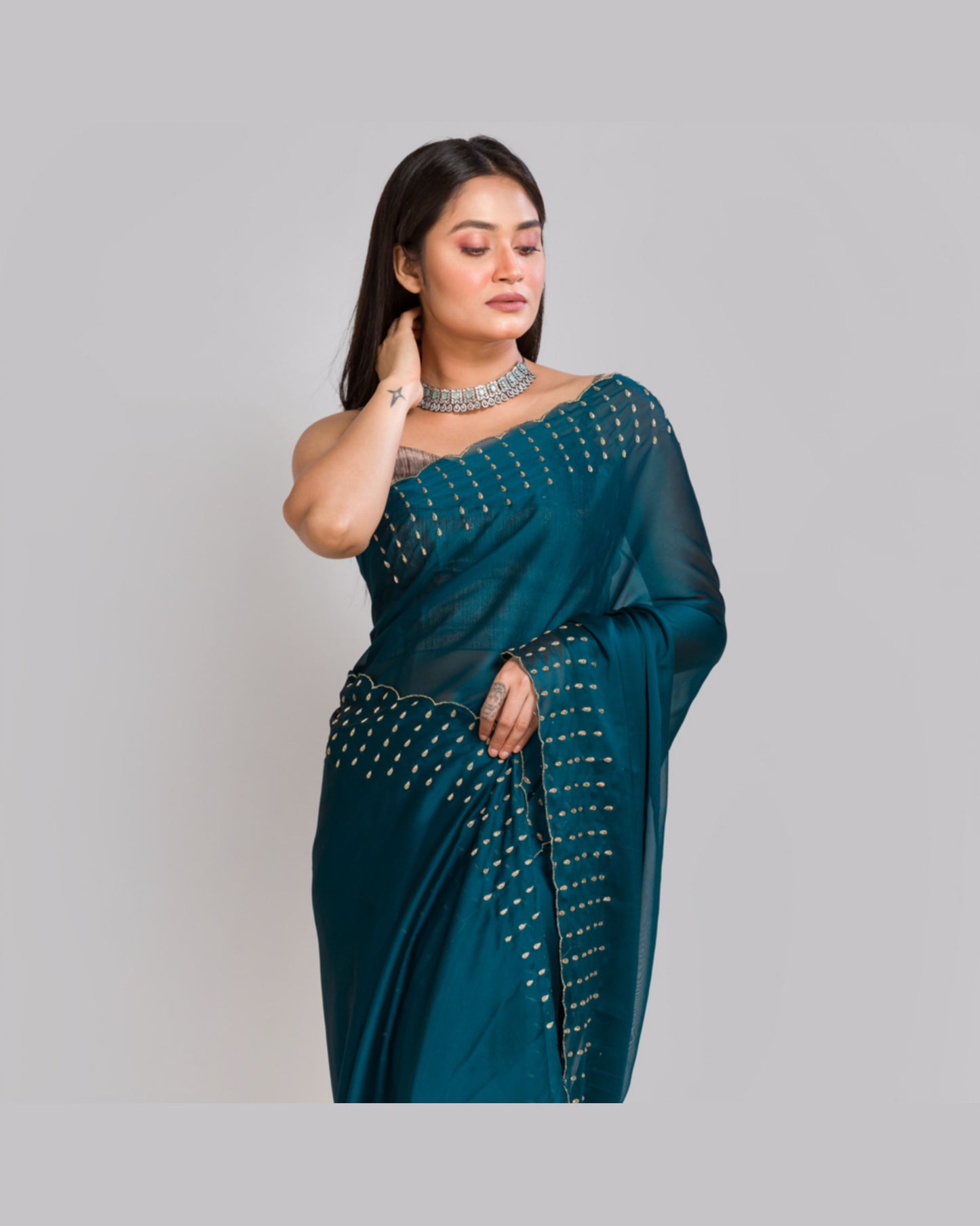 Teal Blue Georgette Silk Saree With Handembroidered Dabka Motifs On Border - kreationbykj